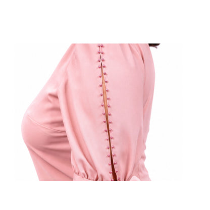 VESTIDO DE PERLAS EN EL BRAZO