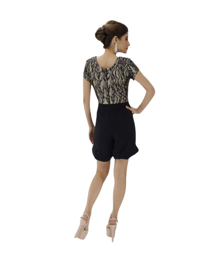 JUMPSUIT CON SOBRE FALDA